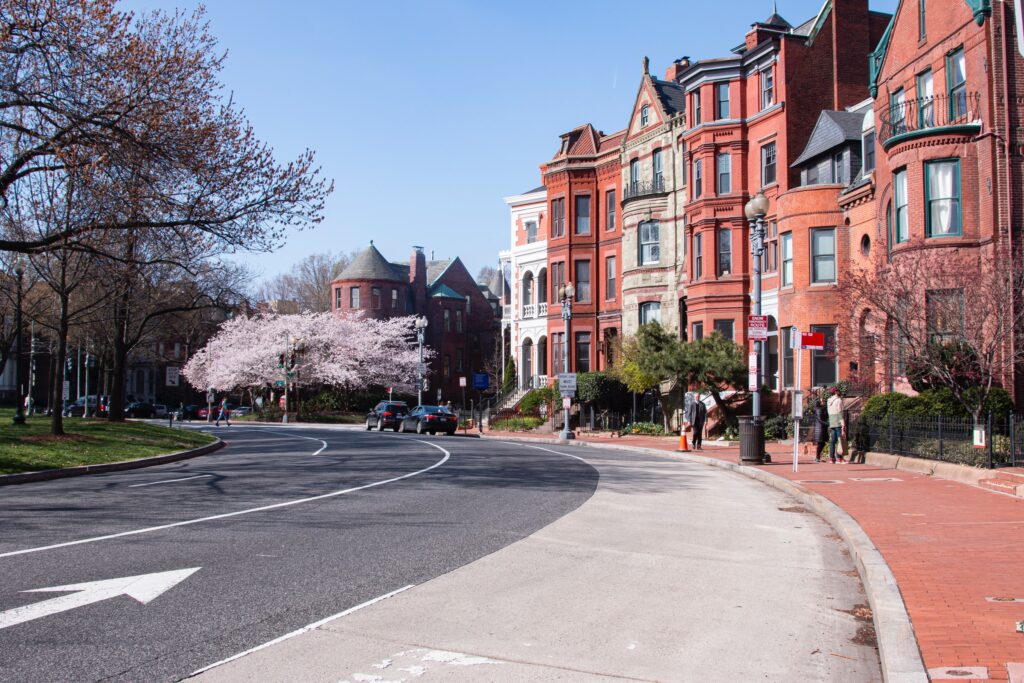 Brown and white buildings in one of the areas in Washington DC for expats